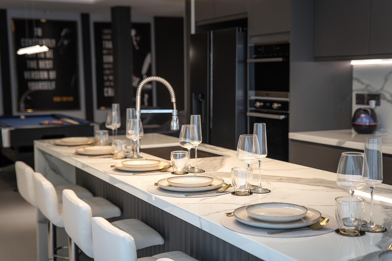 Thabali 120 kitchen island detail with table setting